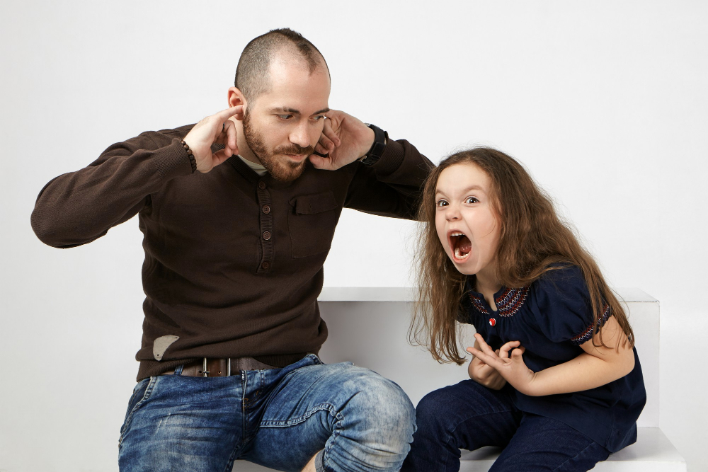 yelling child and frustrated father